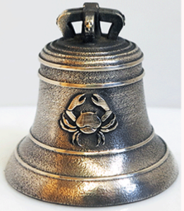 Bronze bell object of an original personalized gift for a birthday